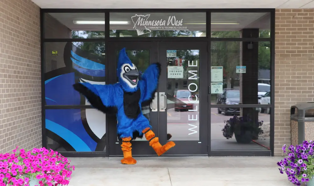 Bluejay Mascot Welcoming Students to the Jackson Campus Front Doors